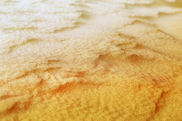 Beautiful texture of yellow sand