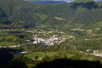 Fototapeta na wymiar valley of furnas (azores) with crater lake and chapel 