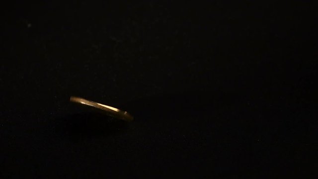 Bitcoin crypto currency for the development of the country. Black background. Slow motion