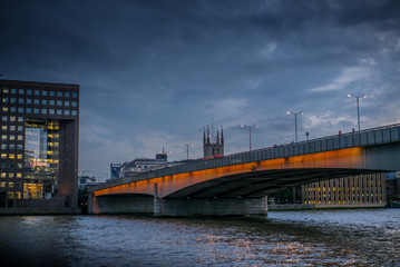 Colorful lights on the London bridge in London at sunset