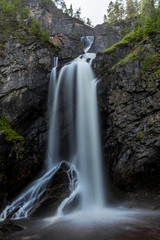 Beautiful waterfall in the Rondane Norwegian national park - 1