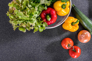 Set of vegetables Fresh mix delicious ingredients healthy for cooking or salad making on black background, concept of healthy eating, top view, copy space