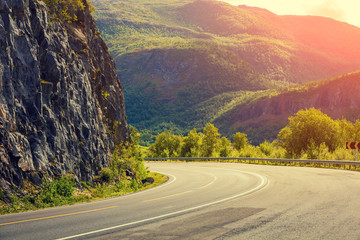 The turn of the mountain road. Driving on a mountain road. The beautiful nature of Norway