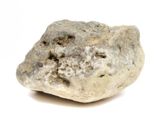 Single natural stone on white background