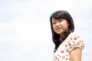 a portrait of beautiful woman in the park