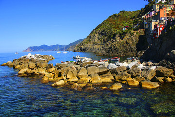 Fototapeta na wymiar view of Riomaggiore harbour with boats, Cinque Terre national park, Liguria, Italy