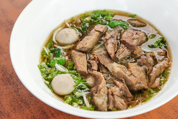 Braised beef with meat ball noodle soup.