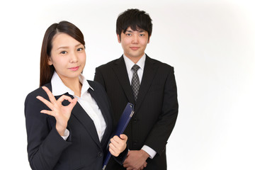 笑顔のビジネスマンとOL
