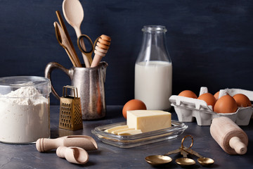 Baking ingredients and kitchen utensil for cooking and baking - obrazy, fototapety, plakaty