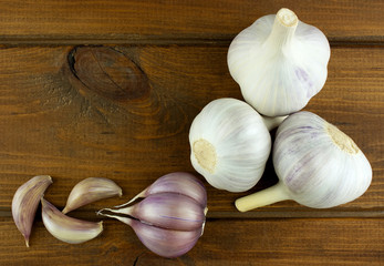 Garlic on a vintage wooden background