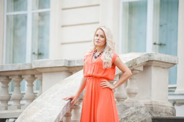 woman walking near palace