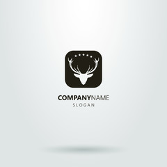 black and white logo with a deer head icon