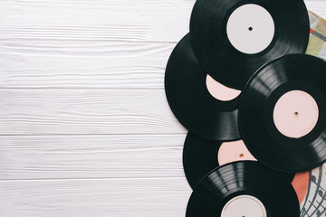 music records on wooden background