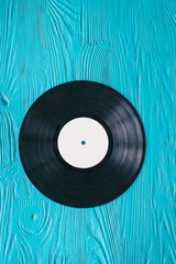 music records on wooden background