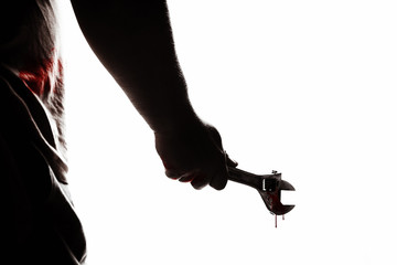 Attack with a wrench. Hand with a hammer. Murder with a wrench.