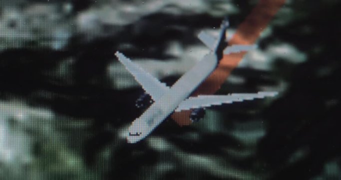 Close-up shot of seat monitor. Display showing plane flight path on the map