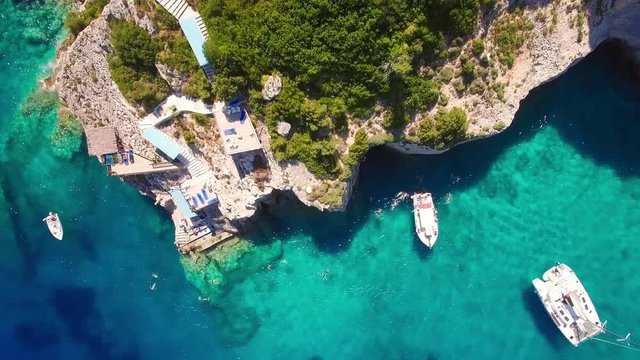 4K (UHD) Aerial view of  Agios Nikolaos blue caves  in Zakynthos (Zante) island, in Greece 
