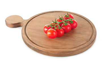 Wooden board with tomatoes isolated on white