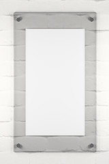 Glass poster on white brick background
