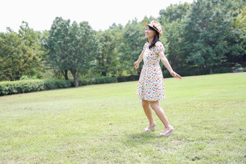 a portrait of beautiful woman in the park