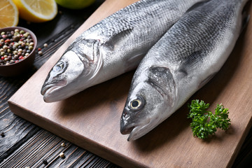 Fresh fish on wooden board