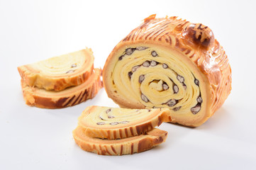 bake bread with wood grain on a block wood isolated on white background