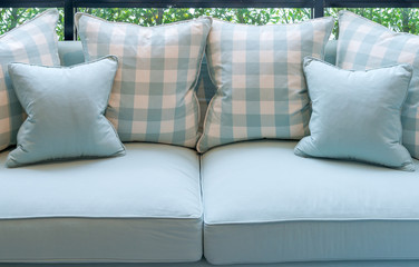 Modern fabric pillow on luxury fabric sofa interior