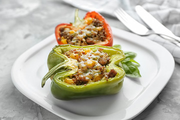 Quinoa stuffed peppers on white plate