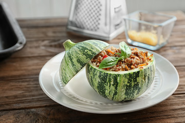 Quinoa stuffed zucchini on white plate