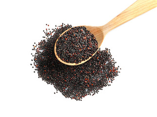 Spoon and black quinoa grains, isolated on white