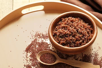Rolgordijnen Bowl with boiled quinoa grains on tray © Africa Studio