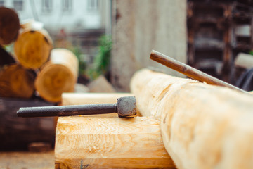 the hammer rests on the beam