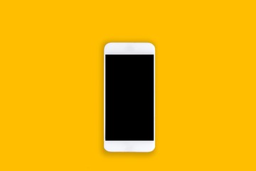 smartphone on yellow background.using wallpaper for education, business photo.Take note of the product for mobile concept, object or copy space.