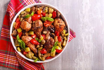 Baked drumsticks with vegetables