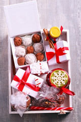 Homemade edible Christmas gifts in a wooden salver
