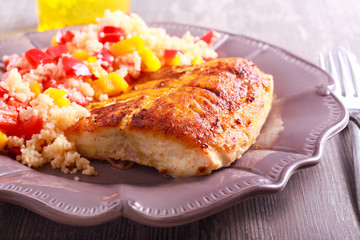 Bighead carp fish fried and vegetable couscous