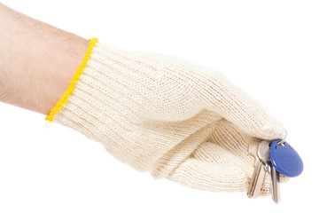 Male hands in construction gloves keys