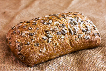 Rye bread with pumpkin seeds  on burlap