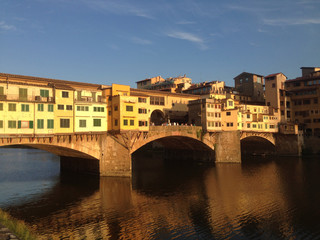 Fototapeta na wymiar Sunset light shining on the Ponte Vecchio