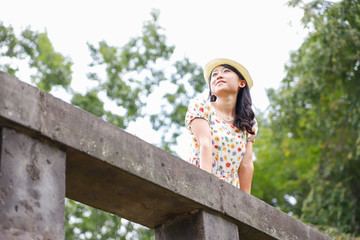 a portrait of beautiful woman in the park