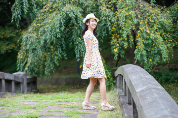 a portrait of beautiful woman in the park