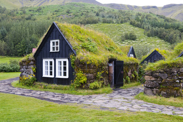 Traditional Icelandic House with grass roof in Skogar Folk Museum, Iceland - obrazy, fototapety, plakaty