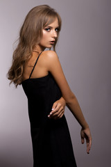 Fototapeta premium Portrait of a beautiful girl with a beautiful make-up
