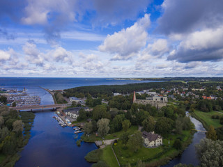 Fototapeta premium Aerial view river in the forest in Tallinn Estonia, district Pirita