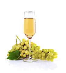 Healthy food. Close-up view bunch of grape with glass of white wine