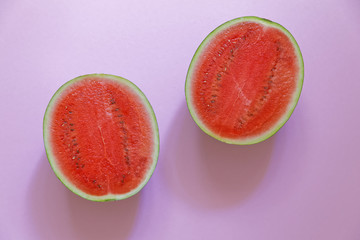 pieces of watermelon on pink background