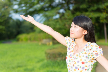 a portrait of beautiful woman in the park