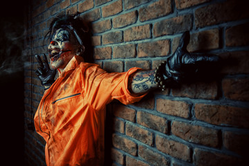 Fototapeta na wymiar frightening crazy clown