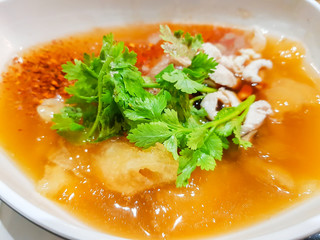 Braised Fish Maw in Red Gravy with crab in bowl