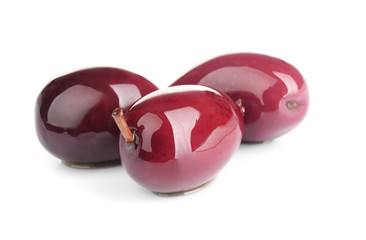 Ripe olives on white background